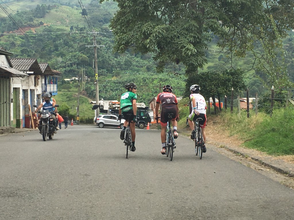 A group of cyclists on the road in Colombia