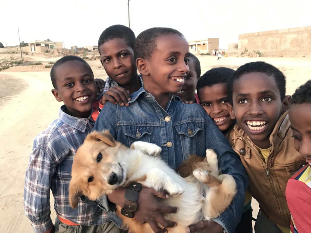 Eritrean children with a dog
