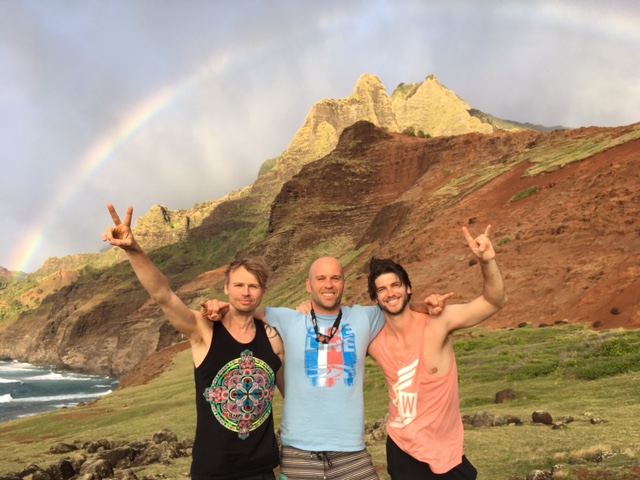 Happy Peter Santenello with two other guys and the rainbow in Kauai