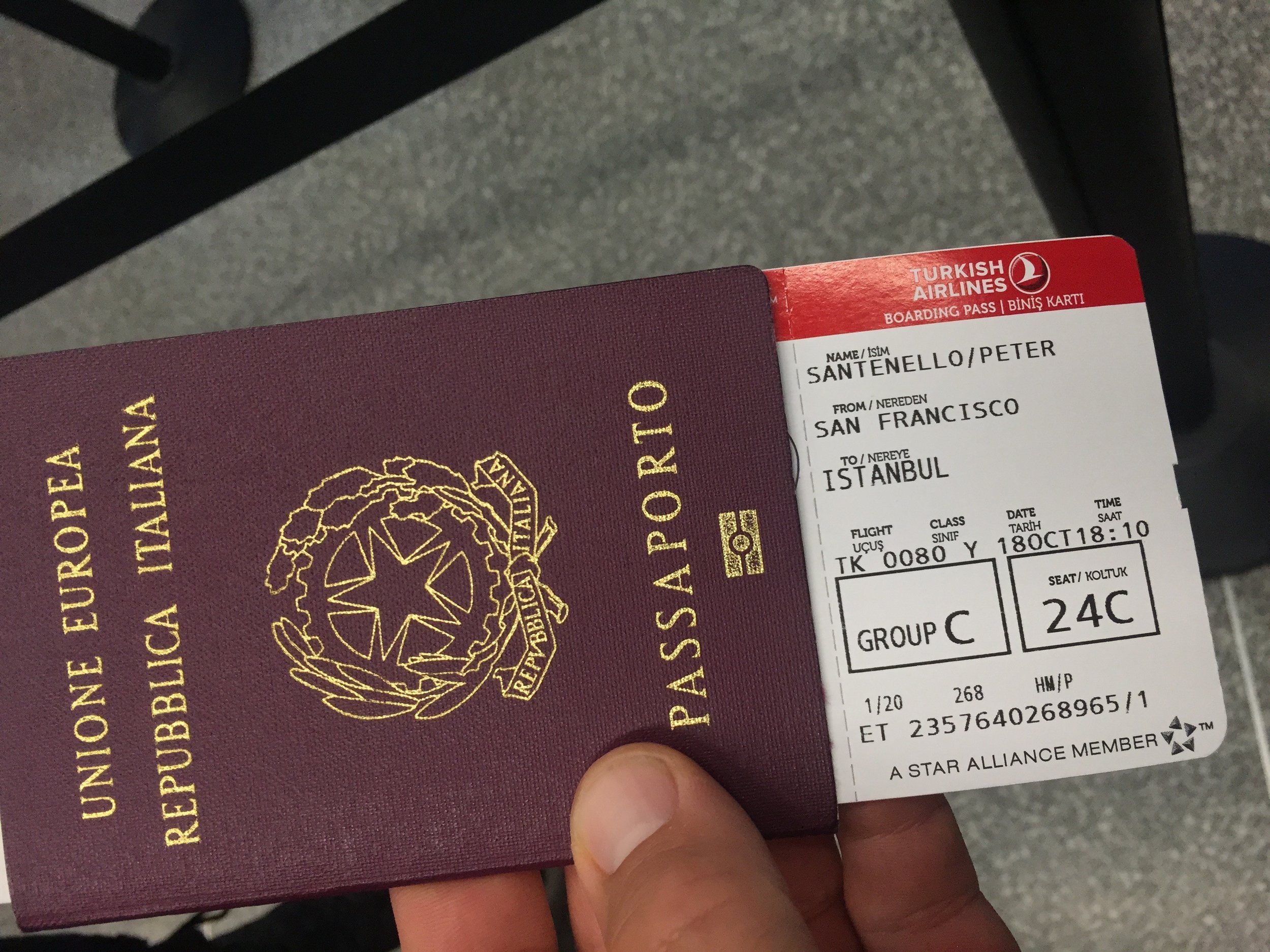 Italian passport and boarding pass