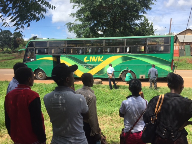 People and bus in Uganda