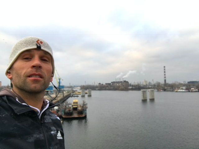 Peter Santenello is running along the Dnipro in Kyiv, Ukraine