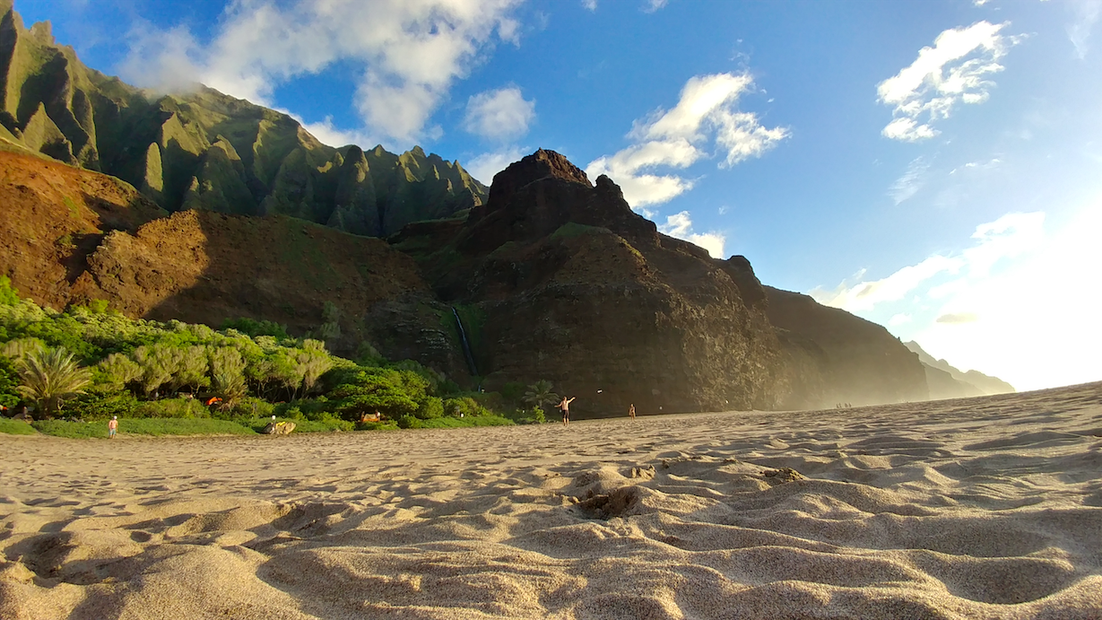 Sandy beach and mountains in Kauai
